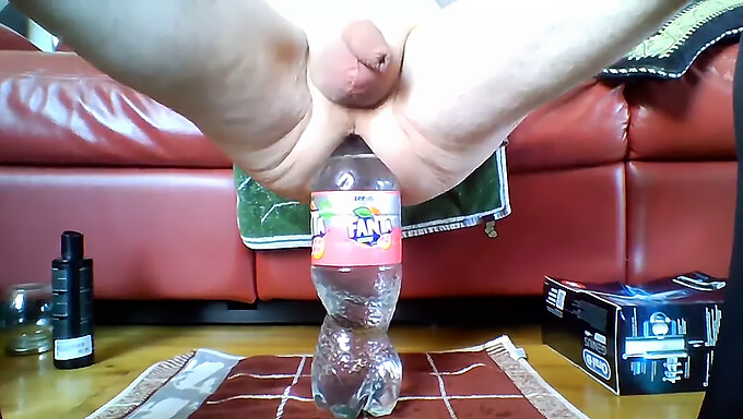 POV solo play with a bottle and fanta-themed anal toy