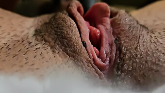 Intense Pleasure: A Close-Up View Of A Woman Reaching Climax