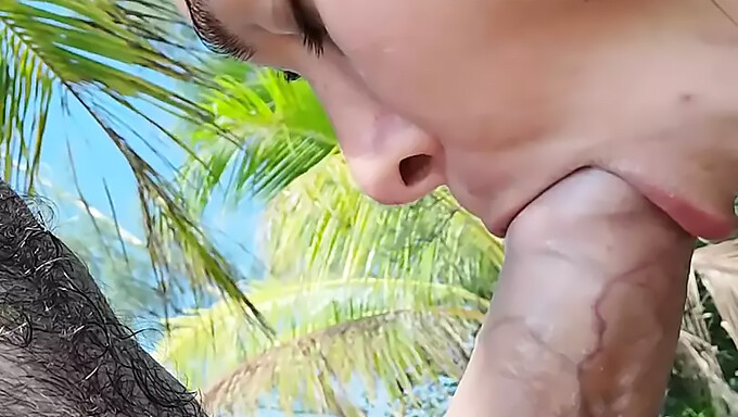 Steamy outdoor blowjob in a tropical setting