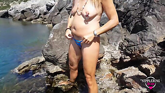 A Busty Blonde Mom Indulges In Extreme Pleasure At A Public Beach, Including Nipple Play And Swimming Nude