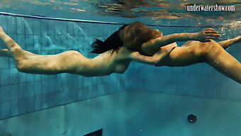 Stunningly Gorgeous And Flawless Teenage Girls Swim Underwater In Outdoor Setting