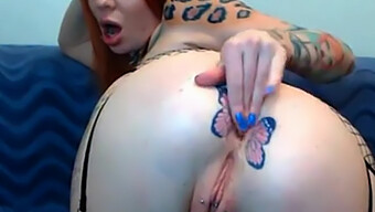 A Closer Look At Inked Butterflies On A Redheaded Webcam Model