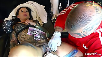 German teen Snowwhite gives a simultaneous tattoo and blowjob